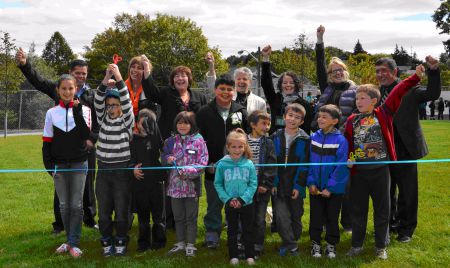 Getting ready to cut the ribbon at the official launch of the green schoolyard (photo provided)