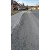 Martindale Road.  "... I ride with 3 kids regularly. Cars drive quite fast on this hill, and are much closer to myself and the kids than I would like them to be when the sand pushes us towards the middle of the road.”  Photo by Laurel O’Gorman